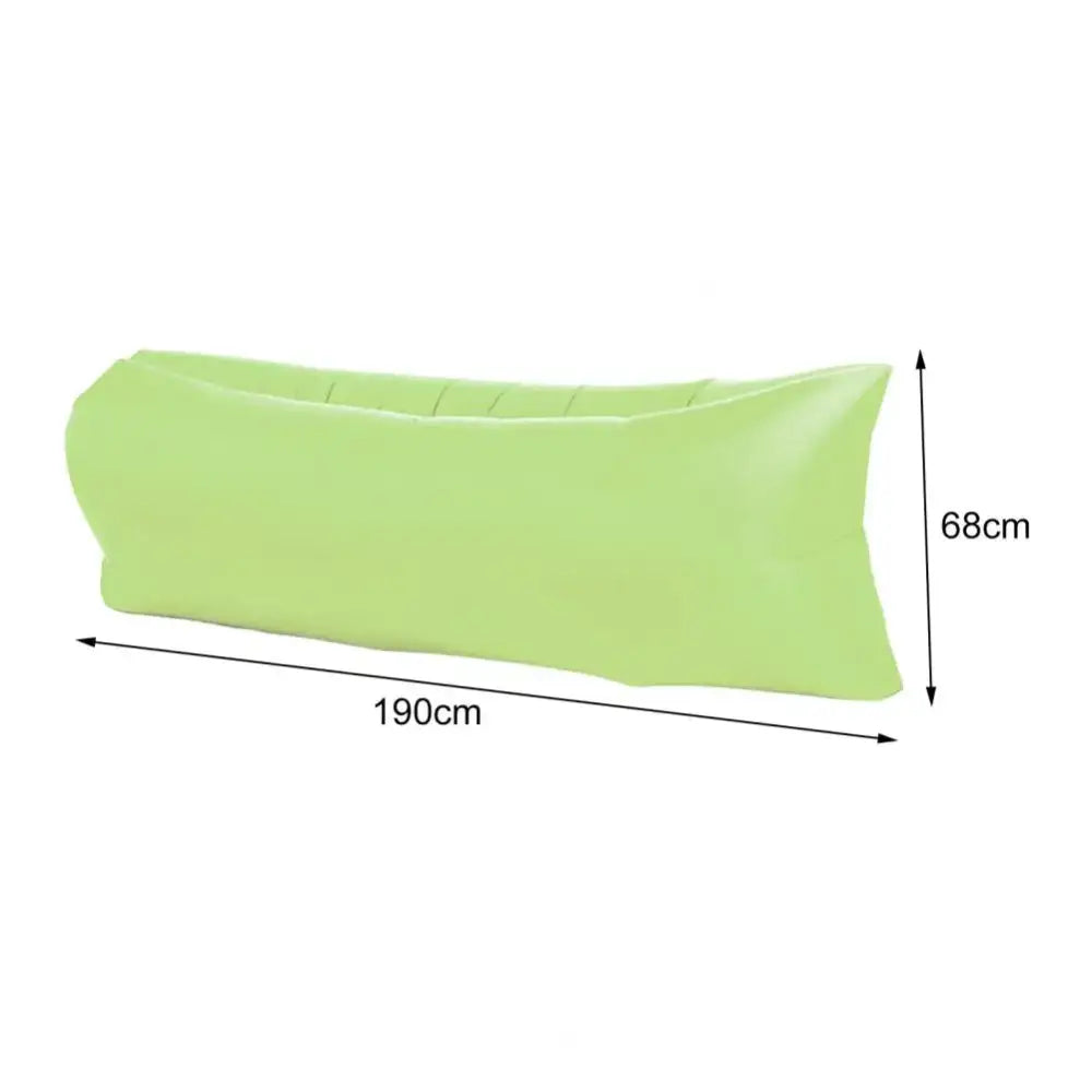 Inflatable light green lounger or air sofa with dimensions labeled.