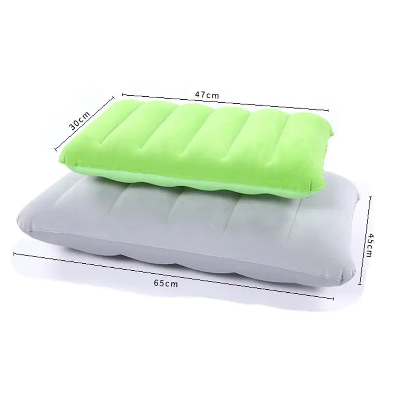 Inflatable travel pillows in green and gray with dimensions labeled.