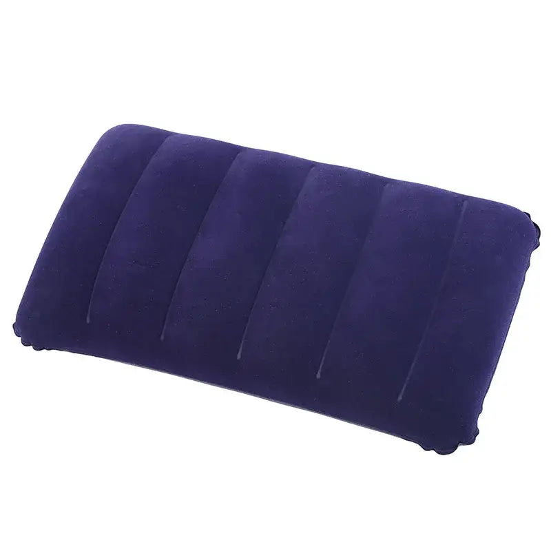 Inflatable navy blue travel pillow with ribbed sections.