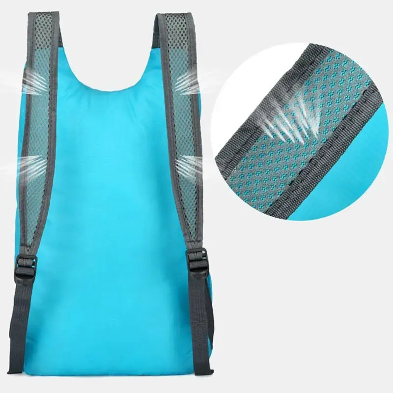 Bright blue backpack with gray mesh shoulder straps and ventilation panels.