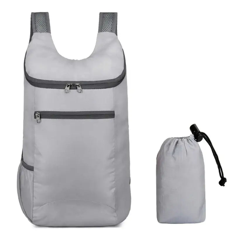 Lightweight foldable backpack with a matching compact storage pouch.