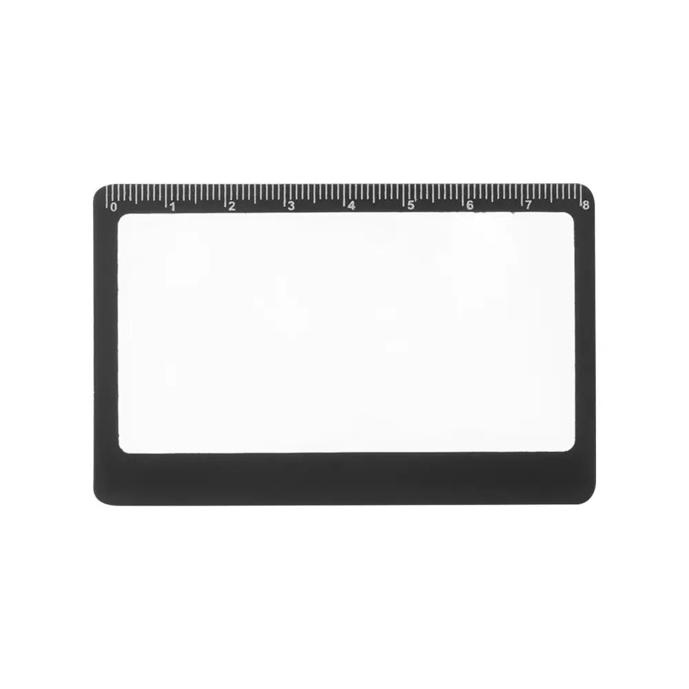 Rectangular magnifying lens with a ruler along the top edge.