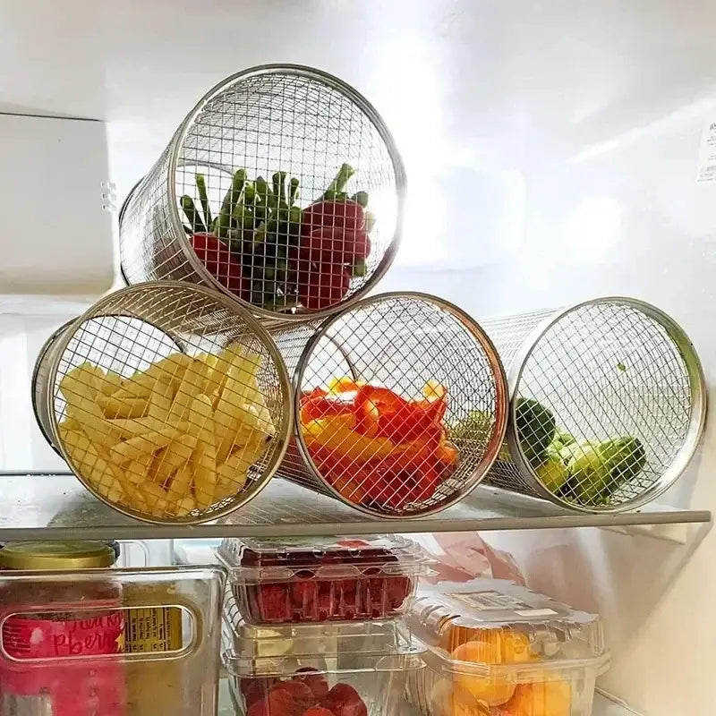 Circular wire mesh containers holding various fruits and vegetables.