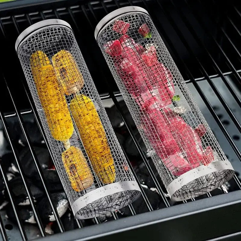 Cylindrical metal mesh containers holding corn and peppers on a grill grate.