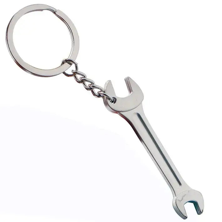 Metallic wrench-shaped keychain with a ring attachment.