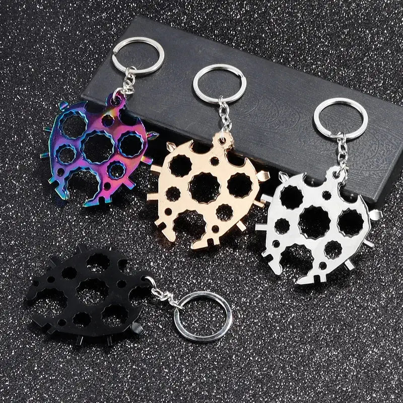 Colorful keychain bottle openers shaped like ladybugs with circular holes.