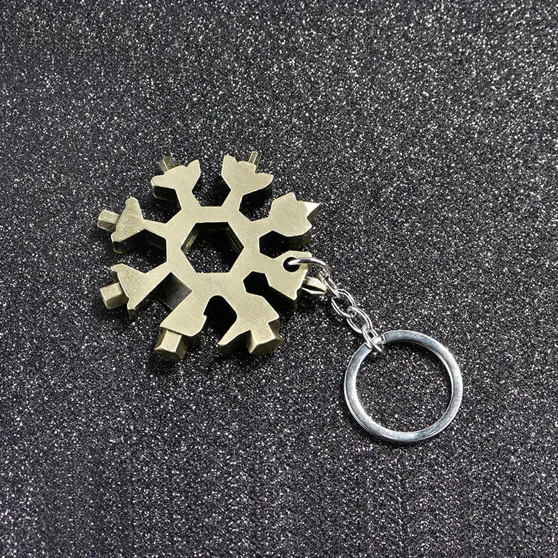 Metallic snowflake-shaped multi-tool keychain.