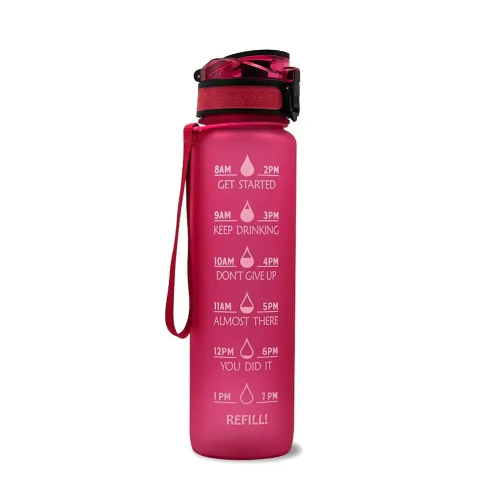 Pink water bottle with time-based motivational messages printed on the side.