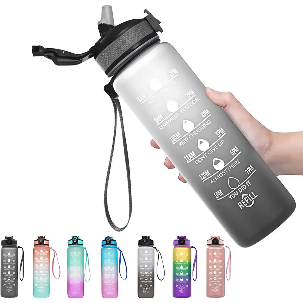 Reusable water bottle with time markings and motivational phrases.