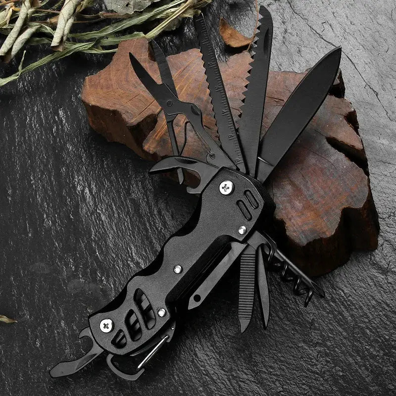 Multi-tool with various blades and implements unfolded.