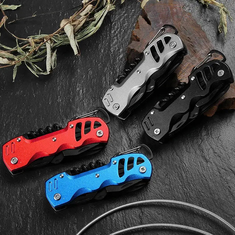 Folding pocket knives in red, blue, silver, and black colors.