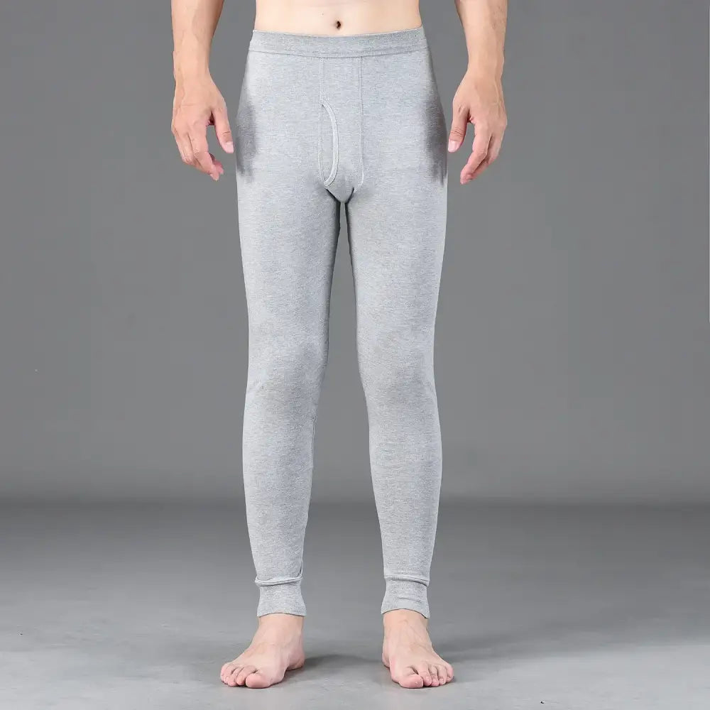 Light gray thermal underwear or long johns worn on a person’s lower body.