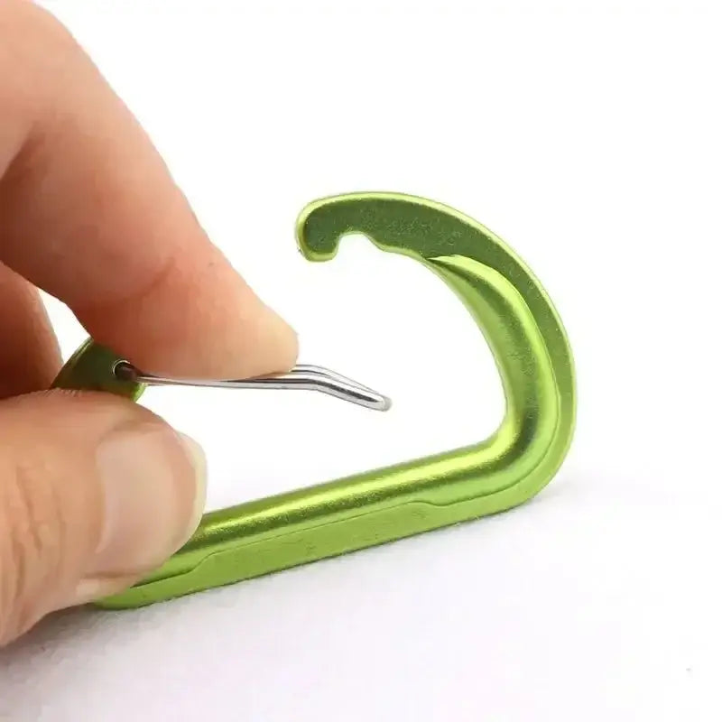 Green plastic hook with a metal clip attachment.