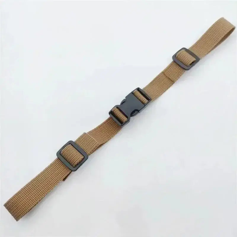 Tan nylon strap with black plastic buckles and adjusters.