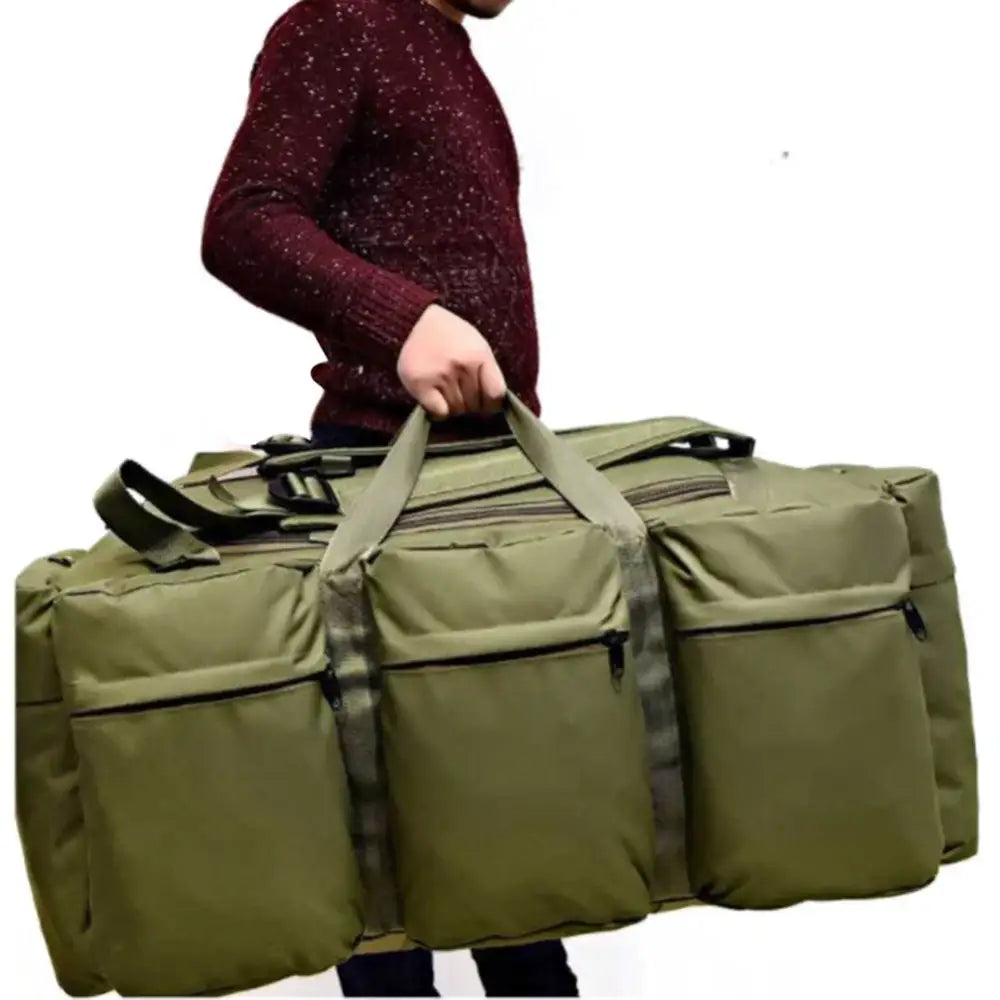 Olive green duffel bag with multiple compartments and carrying straps.