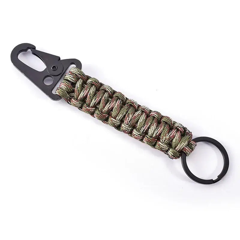 Camouflage-patterned paracord keychain with a carabiner clip and metal ring.