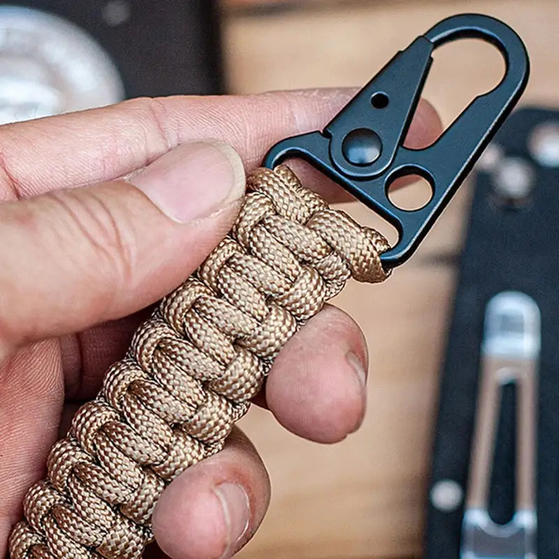 Paracord keychain with a metal carabiner clip.