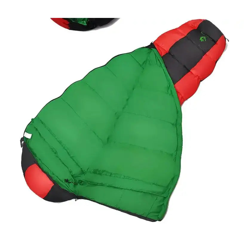 Sleeping bag with a bright green body and red-black accents.