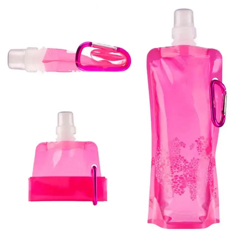 Collapsible pink water bottle with a carabiner clip.