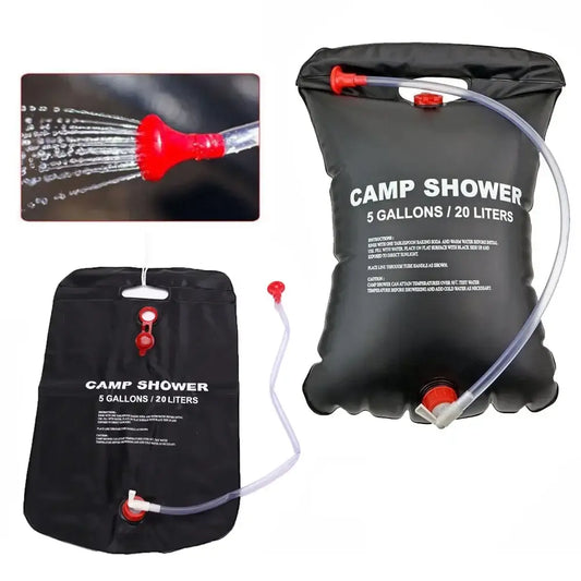 Portable camping shower bag with attached hose and nozzle.