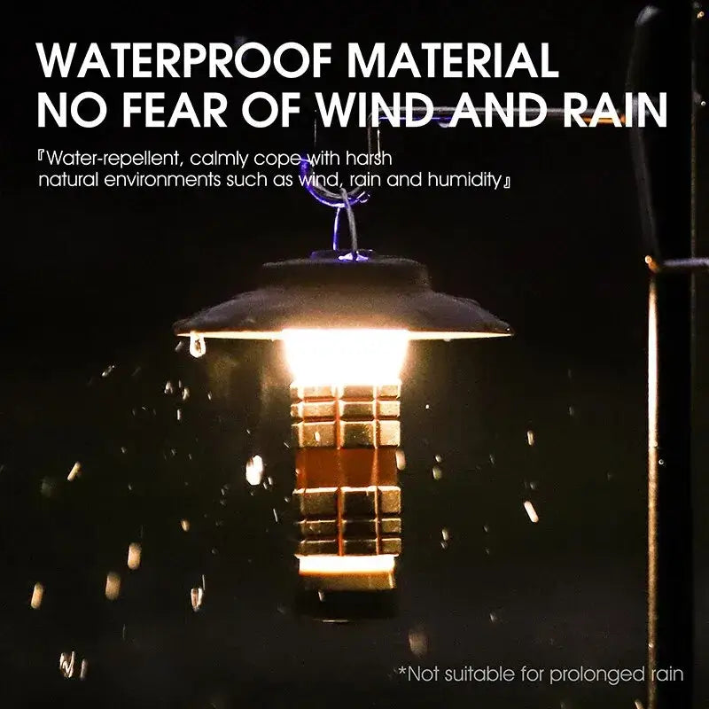 Illuminated outdoor lantern with a metal frame and glass panels surrounded by falling raindrops.