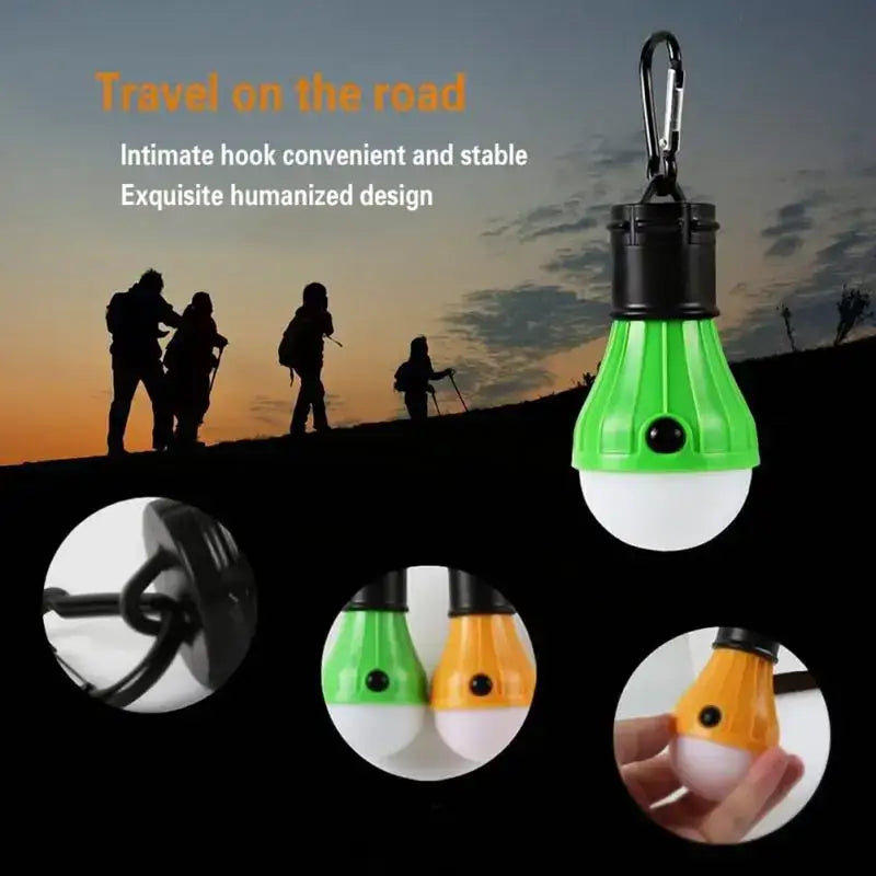 Portable LED camping light bulb with a carabiner clip attachment.