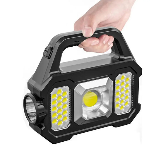 Portable LED work light with multiple illumination panels and a carrying handle.