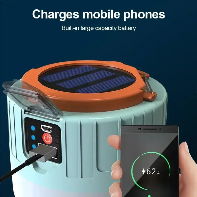 Portable solar-powered charging station with a cylindrical design and orange solar panel on top.