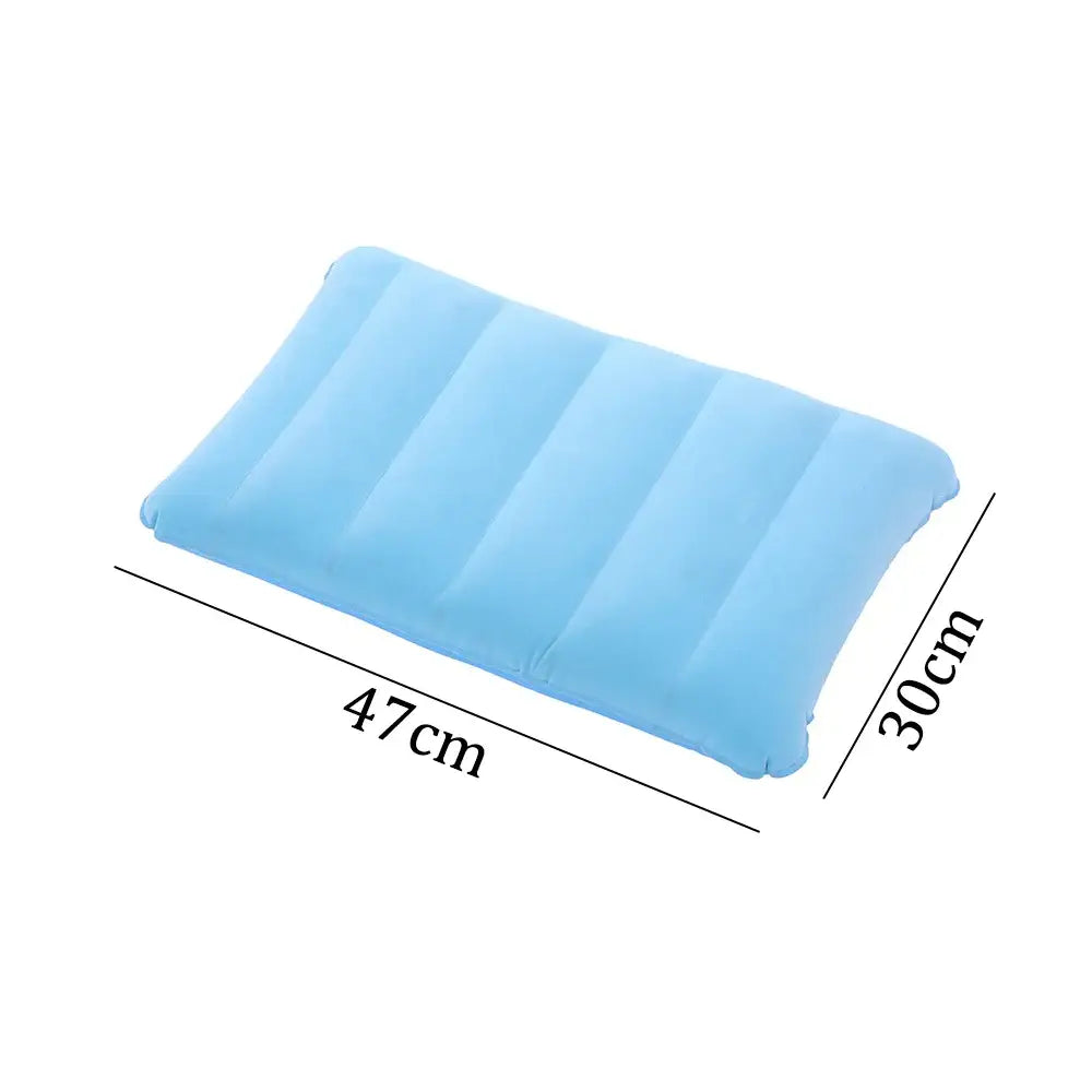 Light blue inflatable pillow or cushion with vertical ribbed sections.