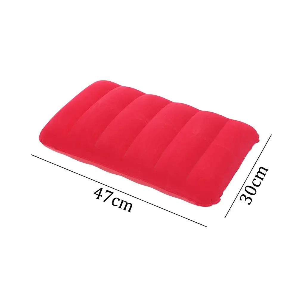 Red inflatable pillow or cushion with ribbed sections.