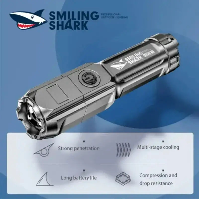 Metallic tactical flashlight with a shark logo and multiple features listed below it.