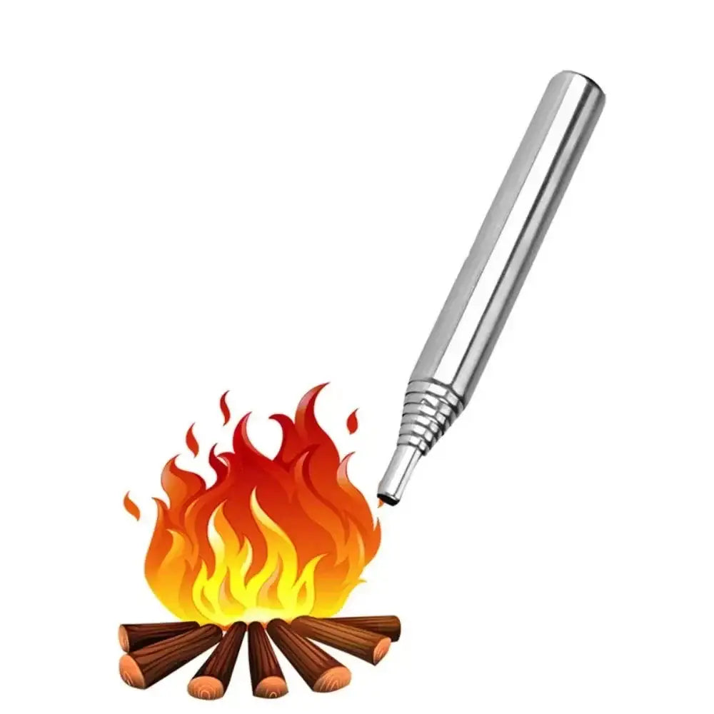 Metallic pen or stylus hovering over a flame and burning logs.