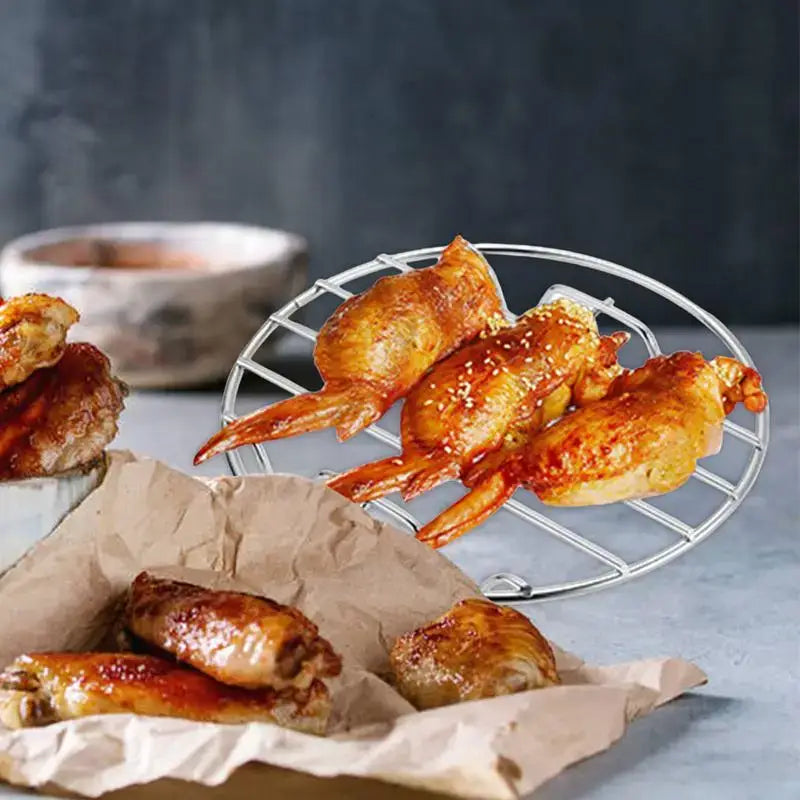 Golden-brown roasted chicken wings with sesame seeds.