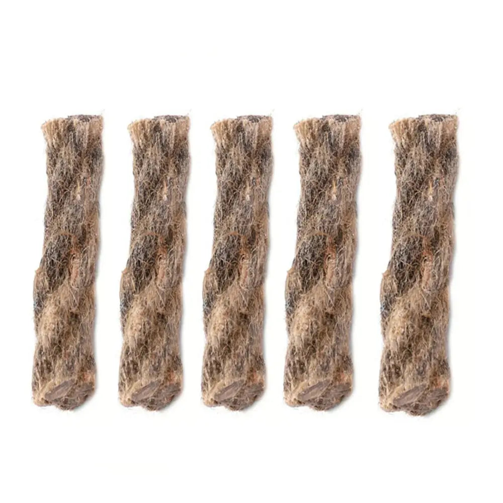 Five strips of matted, grayish-brown animal fur or hair.