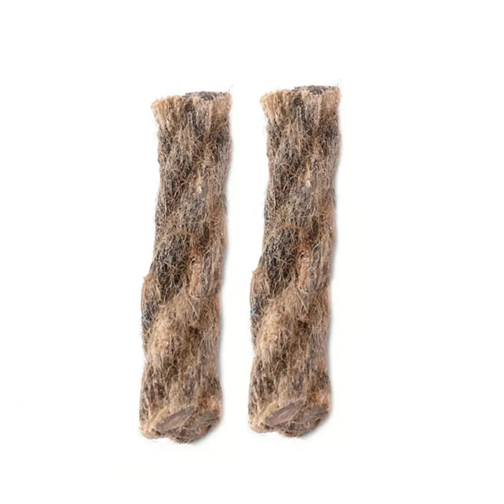 Two cylindrical pieces of matted, tangled fur or hair.