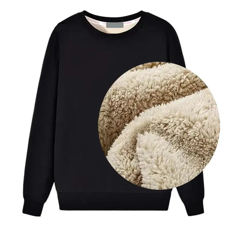 Black sweatshirt with a circular inset showing fluffy sherpa lining.