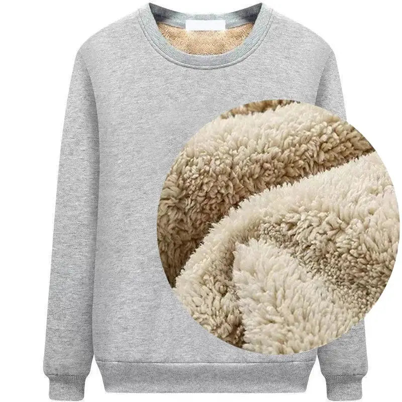 Gray sweatshirt with a circular sheepskin or fleece pattern on the front.