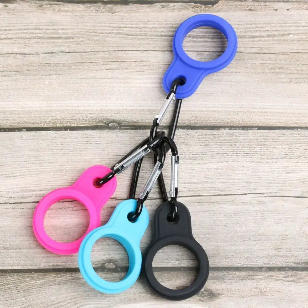 Set of colorful carabiners with finger loops attached together.