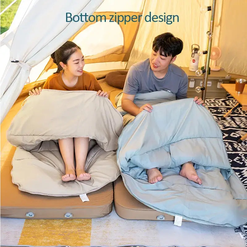 Sleeping bag with a bottom zipper design for camping or outdoor use.