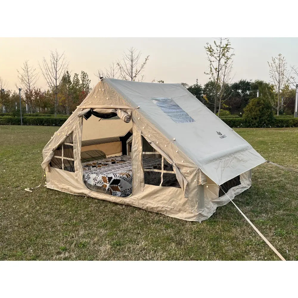 Canvas tent with mesh windows and a solar panel on the roof.