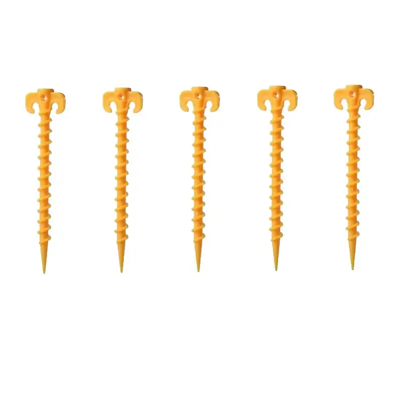 Yellow plastic tent stakes or pegs with spiral shafts and T-shaped tops.