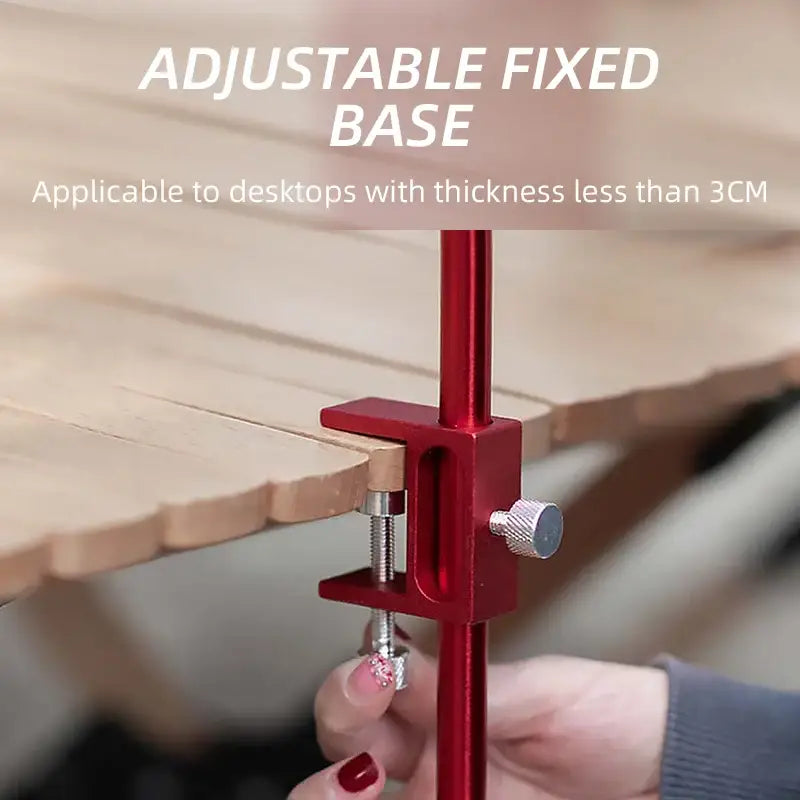 Red adjustable clamp-on desk mount with a vertical support rod.