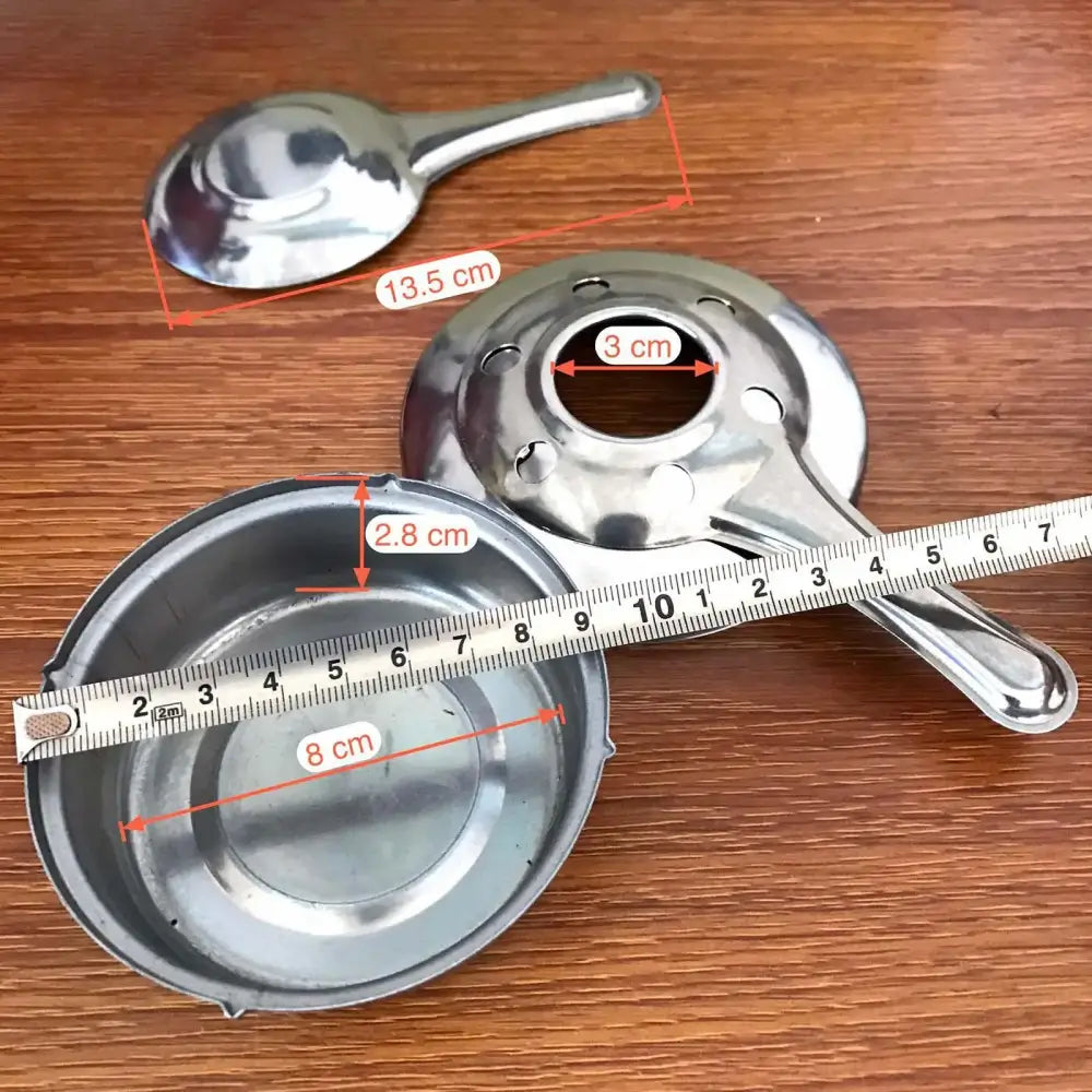 Stainless steel tea strainer with measurements indicated for different parts.