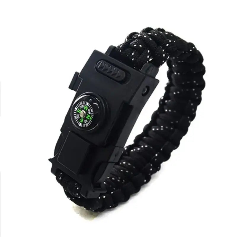 Black paracord survival bracelet with a built-in compass.