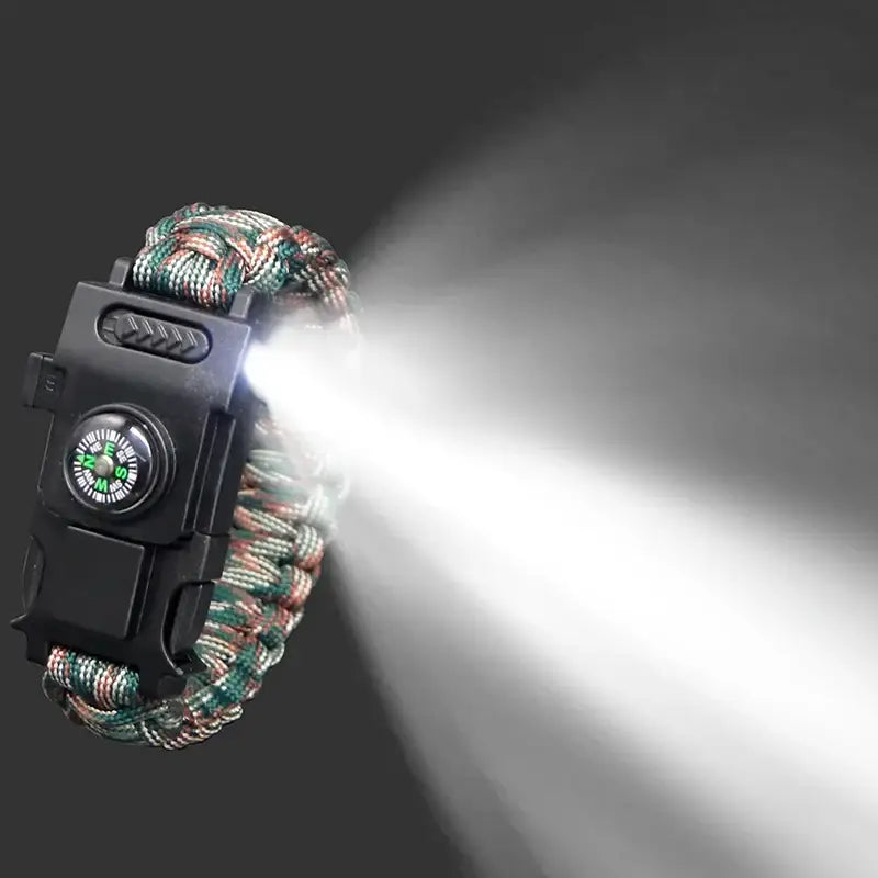 Survival bracelet with built-in LED light and compass.