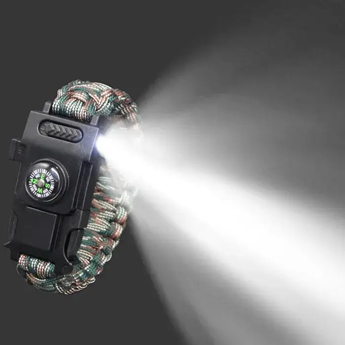 Survival bracelet with built-in LED light and compass.