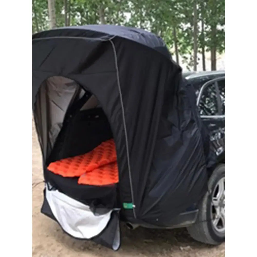 Enclosed bicycle trailer with a black cover and orange interior padding.