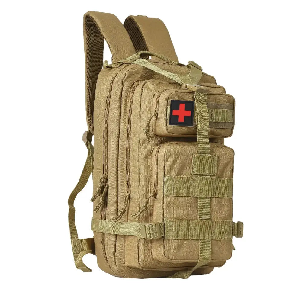 Tan tactical backpack with multiple compartments and a red cross medical patch.