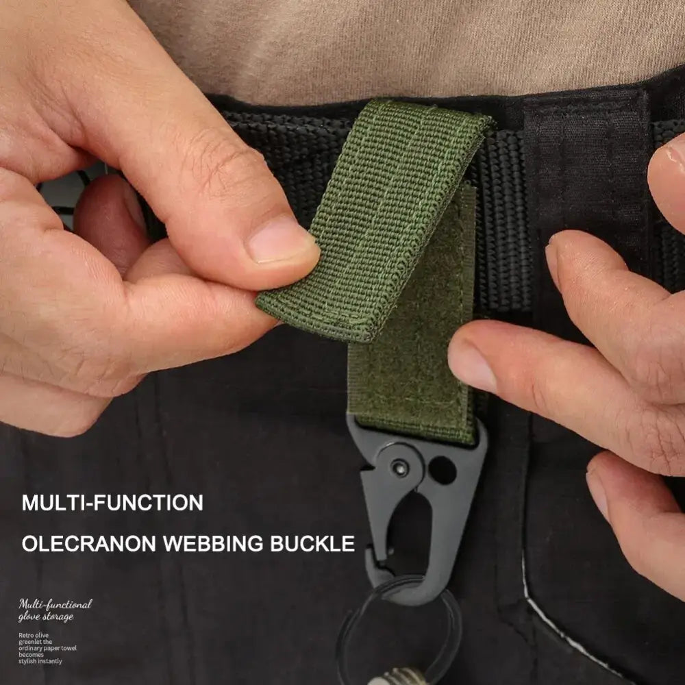 Multi-function olecranon webbing buckle with green strap and metal clip.