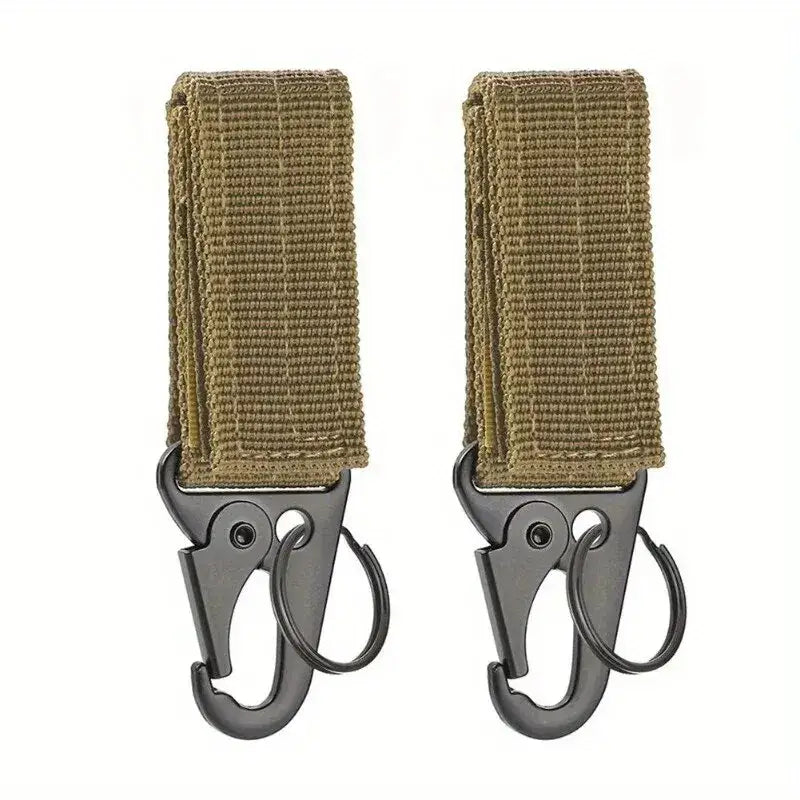 Pair of tactical key fob attachments with carabiner-style hooks and olive green webbing straps.